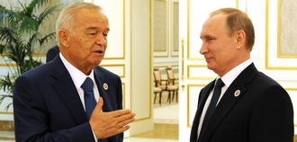 Poetin en Karimov staan samen op een officiële foto.