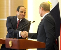Poetin schudt handen met Al-Sisi